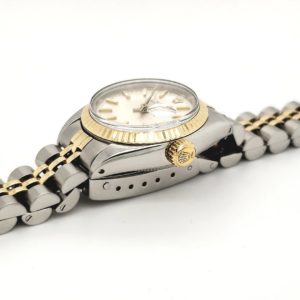 Beautiful ladies Rolex 14 karat yellow and Stainless steel. Model # 6917 ,automatic date, silver dial with stick hour markers. Fluted bezel and acrylic crystal, yr 78-79 jubilee bracelet serviced with one year warranty