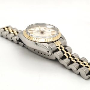 Beautiful ladies Rolex 14 karat yellow and Stainless steel. Model # 6917 ,automatic date, silver dial with stick hour markers. Fluted bezel and acrylic crystal, yr 78-79 jubilee bracelet serviced with one year warranty