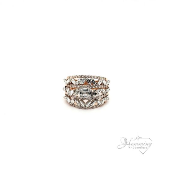 Stunning 14 karat two-tone rose & white gold scattered baguette ring. set with round and baguette diamond at 1.8 ctw, size 7.5, weighs 8.6 grams, 16mm