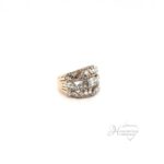 Stunning 14 karat two-tone rose & white gold scattered baguette ring. set with round and baguette diamond at 1.8 ctw, size 7.5, weighs 8.6 grams, 16mm