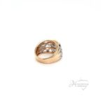 Stunning 14 karat two-tone rose & white gold scattered baguette ring. set with round and baguette diamond at 1.8 ctw, size 7.5, weighs 8.6 grams, 16mm