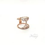 Stunning 14 karat rose gold scattered diamond gap ring set with round and baguette at .52 ctw si/g-h color. size 7, 3.9 grams 18 mm wide.