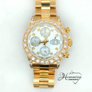Top-down view of the Festina automatic chronograph watch with a clear view of the mother-of-pearl sub-dials.