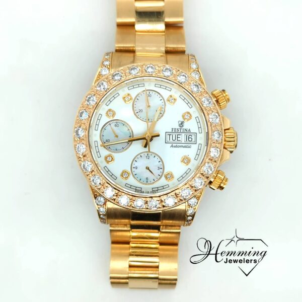 Top-down view of the Festina automatic chronograph watch with a clear view of the mother-of-pearl sub-dials.